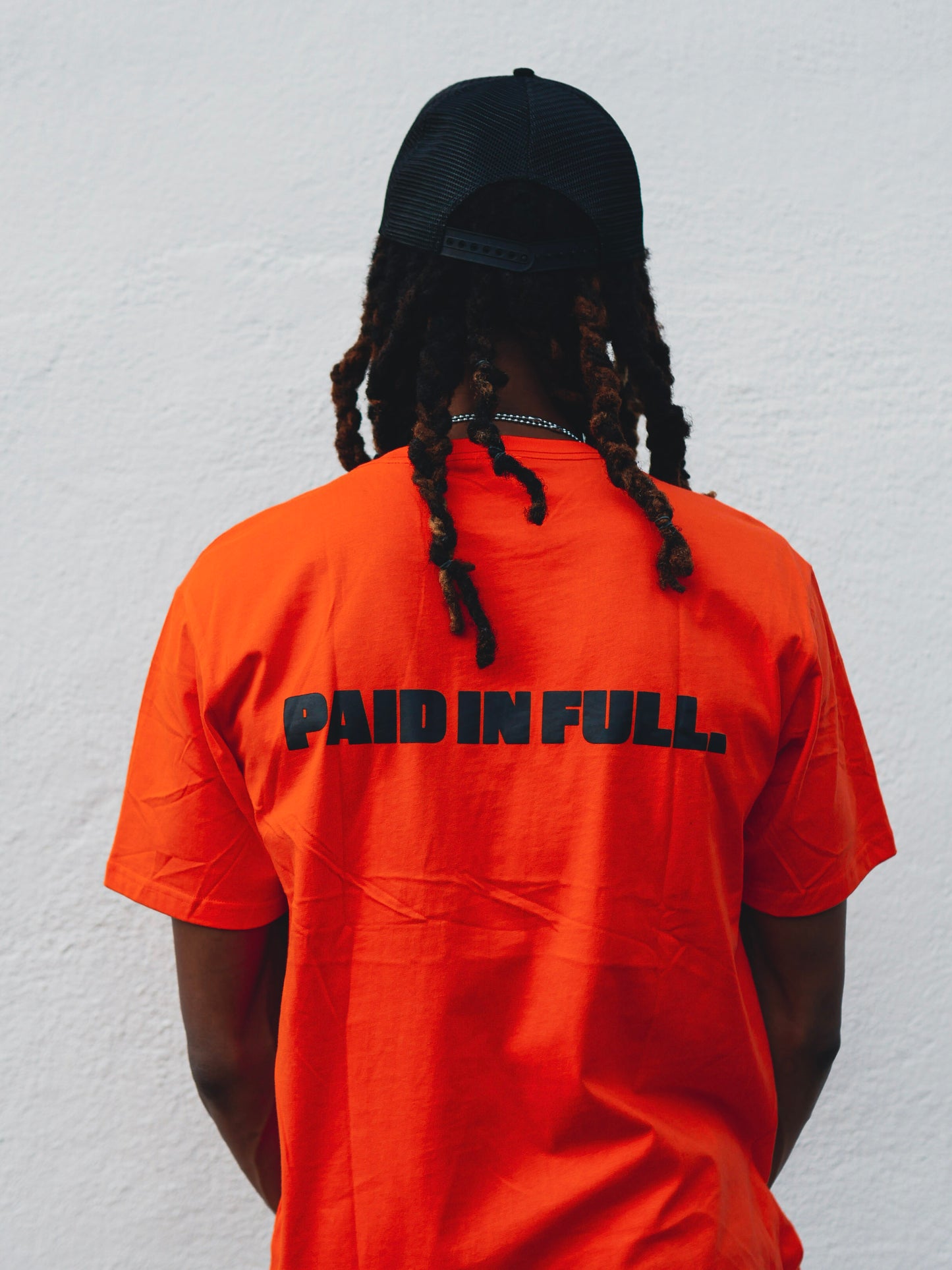 Orange & black paid in full syndicate tee